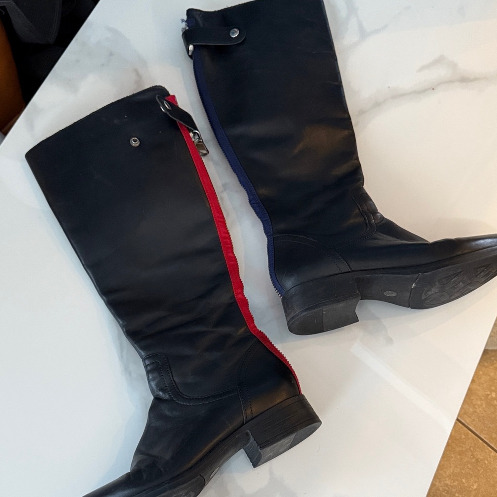 Sleek Black Heeled Boots with Red Zipper